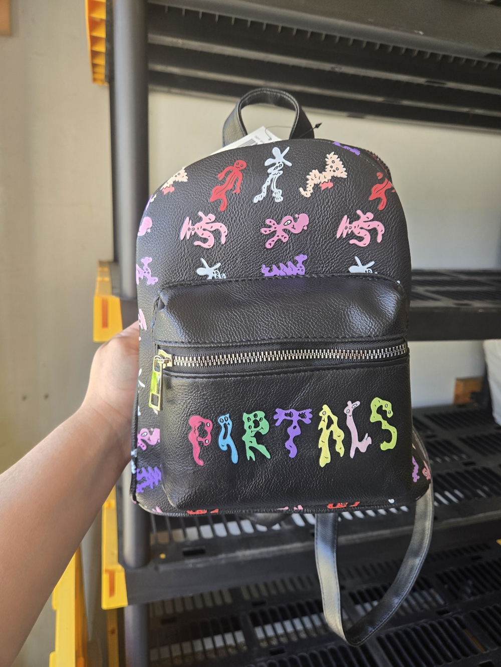 Hot Topic Black Mini Backpack with Multicolor Drippy 'Purrtals' Design